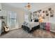 Charming bedroom with unique comic decor, whimsical lighting, and comfortable sleeping arrangements at 2998 Octavia Cir, Marietta, GA 30062