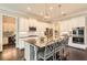 Gourmet kitchen with stainless appliances, granite island, and a butler's pantry at 2998 Octavia Cir, Marietta, GA 30062