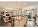 Gourmet kitchen with granite island, stainless appliances, and open layout to the living room at 2998 Octavia Cir, Marietta, GA 30062
