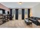 Spacious living room with a large sectional sofa, modern furnishings, and plenty of natural light at 2998 Octavia Cir, Marietta, GA 30062