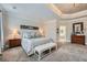 Spacious main bedroom with a tray ceiling, a seating area, and carpet floors at 2998 Octavia Cir, Marietta, GA 30062