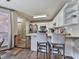 Well-lit kitchen with stainless steel appliances, and breakfast bar with seating at 5228 Boone Ct, Villa Rica, GA 30180