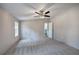 Bedroom featuring neutral walls, ceiling fan and natural light at 62 W Lakeview Dr, Temple, GA 30179