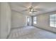 Bedroom with ceiling fan and carpet at 62 W Lakeview Dr, Temple, GA 30179