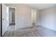 Bedroom featuring plush carpeting, light colored walls and two entry doors at 62 W Lakeview Dr, Temple, GA 30179