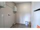 Laundry room with overhead cabinets and durable flooring at 62 W Lakeview Dr, Temple, GA 30179