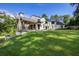 Expansive backyard featuring a modern home design, lush green lawn, and inviting outdoor spaces at 700 N Island Dr, Atlanta, GA 30327