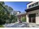 Modern brick house with outdoor fireplace at 700 N Island Dr, Atlanta, GA 30327