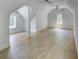 Large, open bedroom with hardwood floors, recessed lights, a ceiling fan, and plenty of natural light at 700 N Island Dr, Atlanta, GA 30327