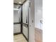 A modern home elevator boasts paneled walls, sleek design, and easy access between floors at 700 N Island Dr, Atlanta, GA 30327