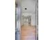 Bright foyer showcasing hardwood floors, modern light fixtures and open floorplan at 700 N Island Dr, Atlanta, GA 30327