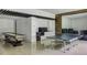 Spacious recreation area with a ping pong table, bar area, accent lighting, and comfortable seating at 700 N Island Dr, Atlanta, GA 30327