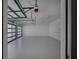 Clean and spacious three car garage with white epoxy flooring at 700 N Island Dr, Atlanta, GA 30327