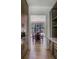 Hallway featuring dark wood cabinets and floors, leading to an open dining area at 700 N Island Dr, Atlanta, GA 30327