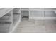 Walk-in pantry with custom shelving and ample storage space for kitchen essentials at 700 N Island Dr, Atlanta, GA 30327
