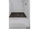 Walk in shower with gray and white tile surround at 700 N Island Dr, Atlanta, GA 30327