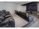 Theater room with plush reclining seats, large screen, and modern sound system at 700 N Island Dr, Atlanta, GA 30327