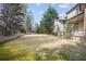 Expansive backyard with manicured lawn, mature trees, and tasteful landscaping, perfect for outdoor activities at 3871 Trickum Road Ne, Marietta, GA 30066