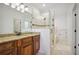 Bathroom featuring a vanity, glass shower door, and soaking tub at 3871 Trickum Road Ne, Marietta, GA 30066