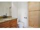 Bathroom with a vanity with a granite countertop and a tiled shower at 3871 Trickum Road Ne, Marietta, GA 30066