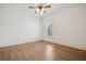 Bedroom featuring hardwood floors and a single window with natural light at 3871 Trickum Road Ne, Marietta, GA 30066