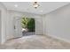 Bonus room with tile flooring, french doors, and a view of the backyard at 3871 Trickum Road Ne, Marietta, GA 30066