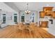 Charming dining area with wood accents and a kitchen view, creating a cohesive entertaining and dining space at 3871 Trickum Road Ne, Marietta, GA 30066