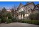 Stunning brick and stone home with manicured landscaping and a circular driveway for an elegant curb appeal at 3871 Trickum Road Ne, Marietta, GA 30066