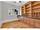 Bright home office featuring custom built-in shelving, storage, and a desk area at 3871 Trickum Road Ne, Marietta, GA 30066