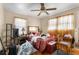 Bedroom with hardwood floors, ceiling fan and natural light at 2631 Miriam Ln, Decatur, GA 30032