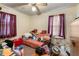 Bedroom with natural lighting, ceiling fan, and closet at 2631 Miriam Ln, Decatur, GA 30032