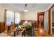 Comfortable dining room with wood paneling and a view into the living area at 2631 Miriam Ln, Decatur, GA 30032