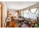 Inviting living room showcasing hardwood floors and natural light through the windows at 2631 Miriam Ln, Decatur, GA 30032