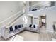 Spacious living room with high ceilings, a staircase, and an open layout at 4119 Ravenwood Ct, Union City, GA 30291