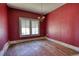 Picture of the living room with hardwood floors and a window at 4398 Highway 142, Newborn, GA 30056