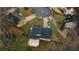 Home with a back deck and private backyard surrounded by tall trees at 3981 Rocmar Dr, Snellville, GA 30039