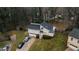 Inviting two-story home with a two-car garage and driveway parking at 3981 Rocmar Dr, Snellville, GA 30039