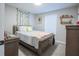 Inviting bedroom showcasing neutral tones, soft carpet, and comfortable furnishings at 3981 Rocmar Dr, Snellville, GA 30039