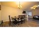 Cozy dining room featuring stylish wood floors, chandelier, and an inviting table set for a comfortable Gathering meal at 3981 Rocmar Dr, Snellville, GA 30039