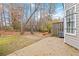 Cozy backyard featuring a patio and a wooded view, perfect for outdoor relaxation and enjoying nature at 6374 Rockaway Rd, Atlanta, GA 30349