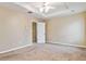 A spacious bedroom with neutral walls and carpet at 6374 Rockaway Rd, Atlanta, GA 30349