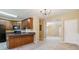 Open kitchen with wood cabinets and ample counter space at 6374 Rockaway Rd, Atlanta, GA 30349