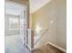 View of the staircase, doors, and carpet at 6374 Rockaway Rd, Atlanta, GA 30349