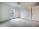 Bedroom featuring neutral paint, carpeted floors, and a window at 1285 Glandor Se Ct, Mableton, GA 30126