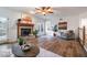 Bright living room with fireplace and neutral finishes with access to the porch at 1285 Glandor Se Ct, Mableton, GA 30126