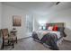 Main bedroom featuring a padded headboard, natural light, and a comfortable aesthetic at 1285 Glandor Se Ct, Mableton, GA 30126