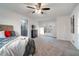 Main bedroom with lots of space, a ceiling fan, and sliding door access to an outdoor deck at 1285 Glandor Se Ct, Mableton, GA 30126
