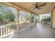 Wide back porch featuring ceiling fan and neutral accents overlooking the backyard at 2876 Alpine Ne Rd, Atlanta, GA 30305