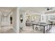 Finished basement with a ping pong table, and an open floorplan to living and dining areas at 440 Belada Blvd, Sandy Springs, GA 30342