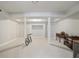 Spacious unfinished basement with neutral carpet, and ample room to add your finishing touches at 440 Belada Blvd, Sandy Springs, GA 30342